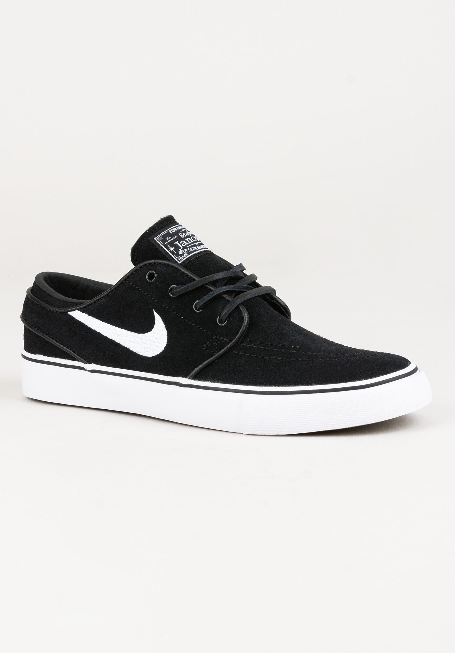 Black and white janoski on sale