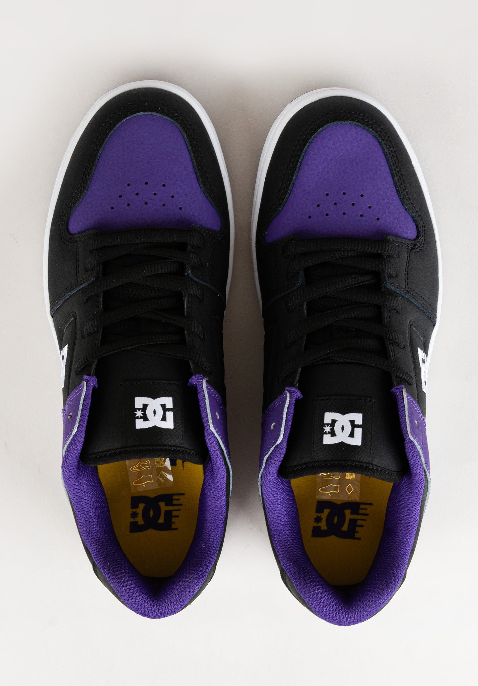 Black and purple dc shoes on sale