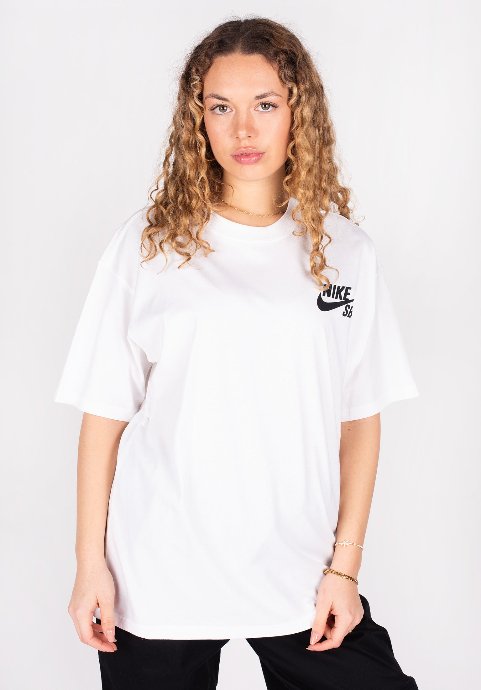 Nike white shirt black logo best sale