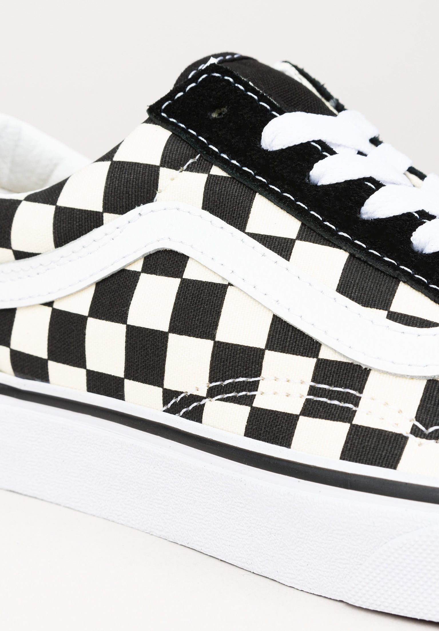 Black and white vans check online