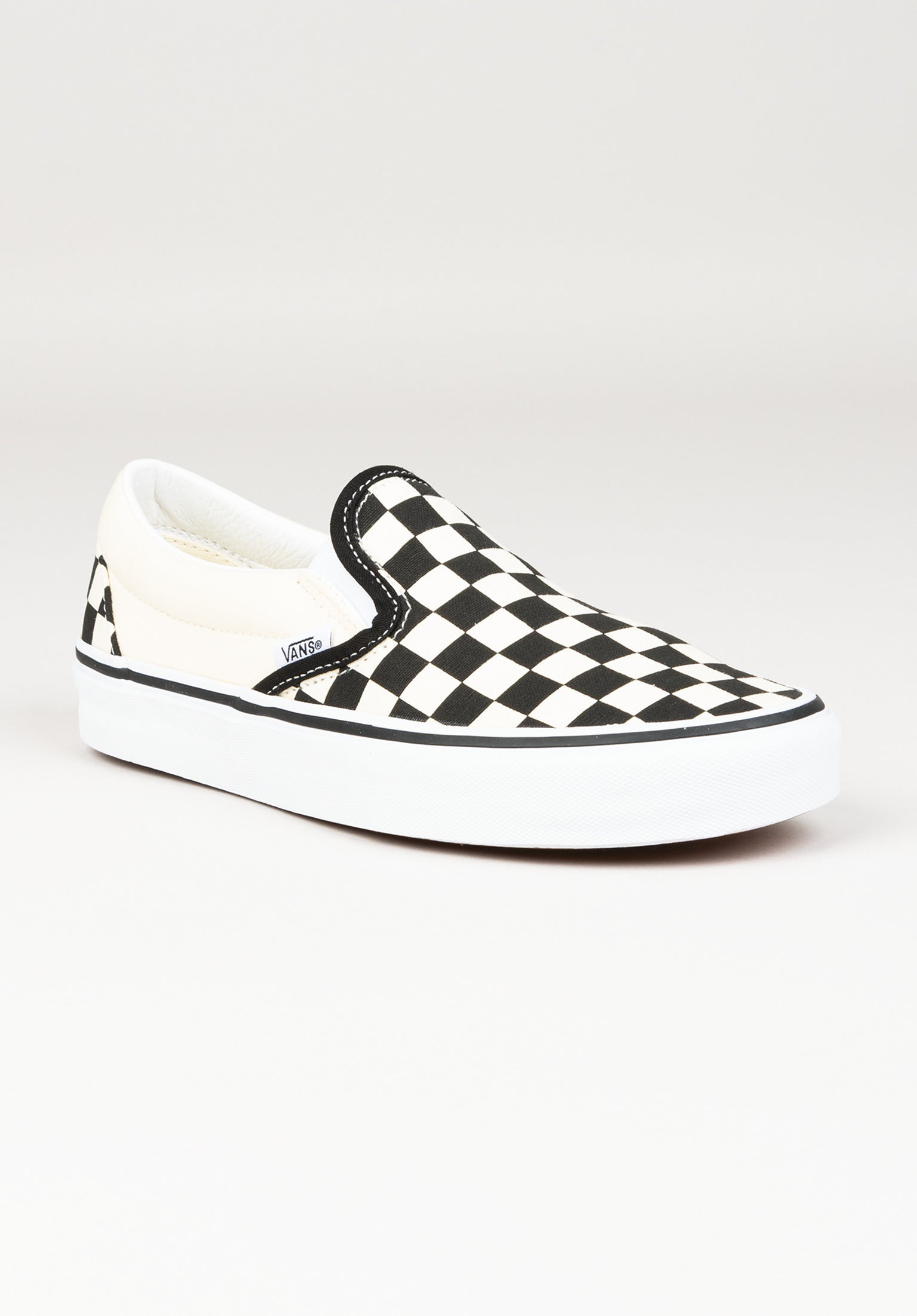 Black and white slip on vans womens on sale