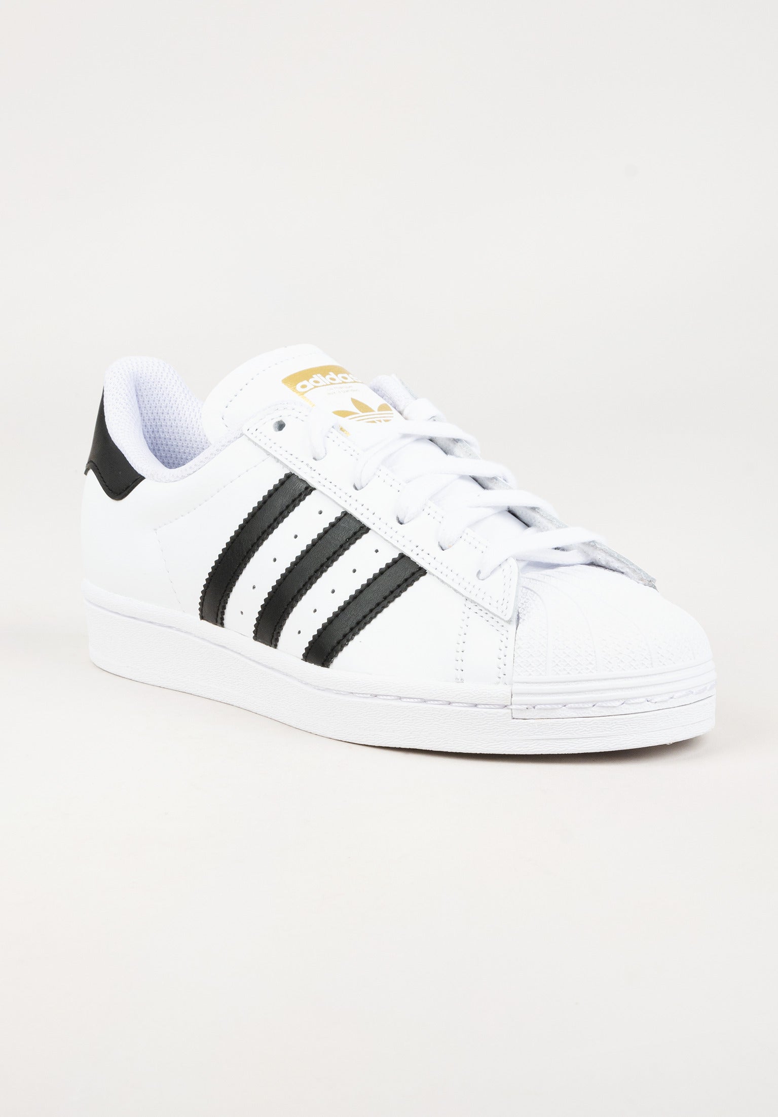 Adidas shoes black white and gold hotsell